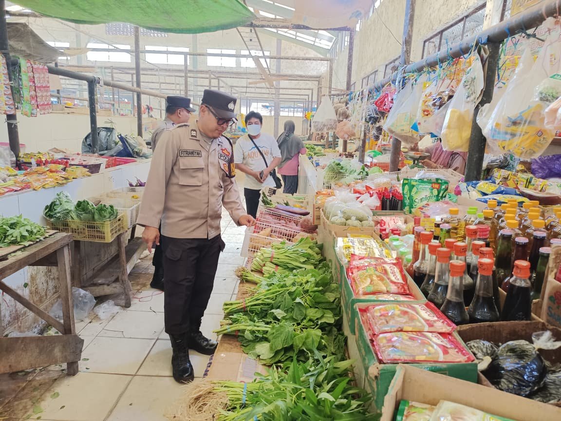 Polsek Bukit Batu Polresta Palangka Raya Hadirkan Rasa Aman di Pasar Rakyat Tangkiling